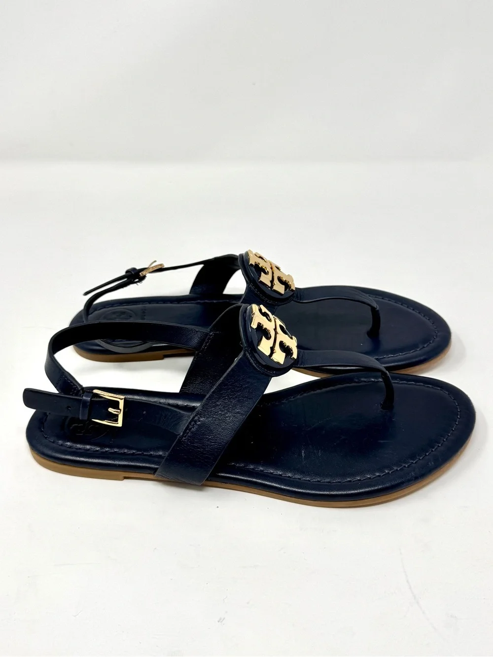 Tory Burch Bryce Navy Leather Logo Thong Sandals with Gold Logo Medallions
